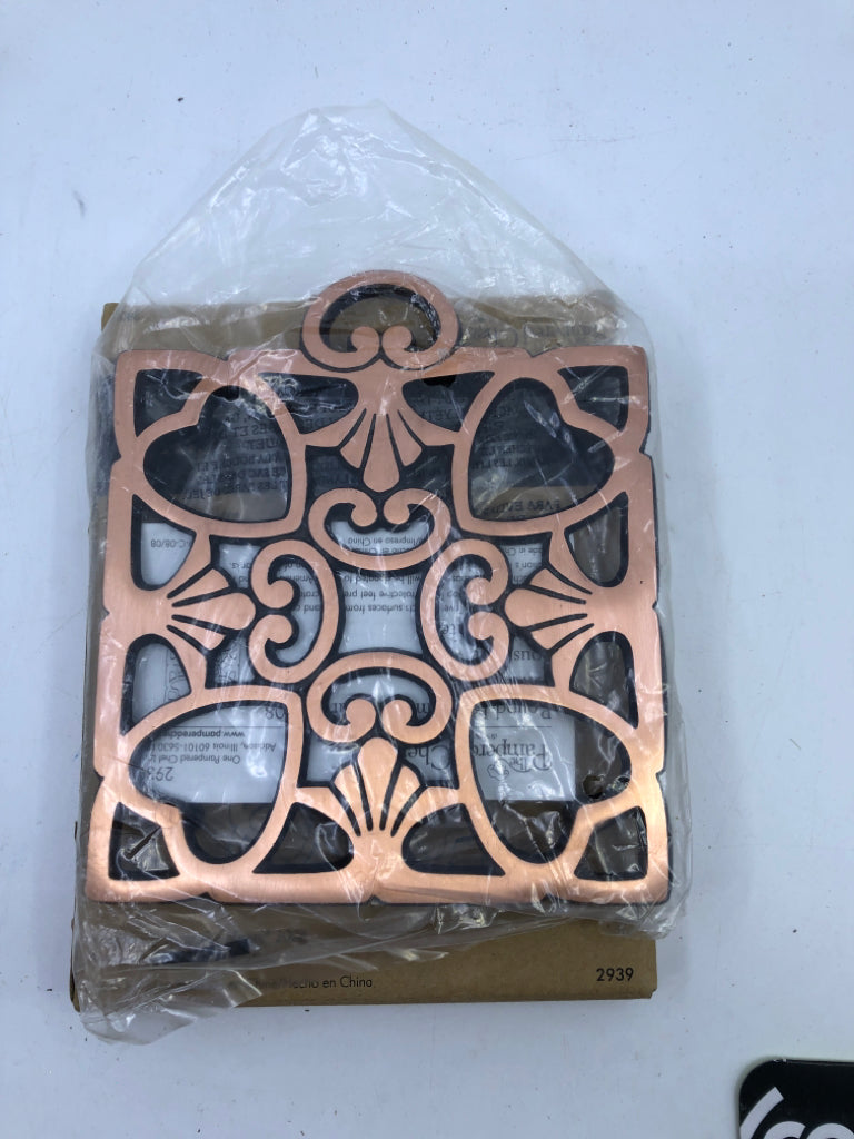 NIB BRONZE HEART TRIVET.