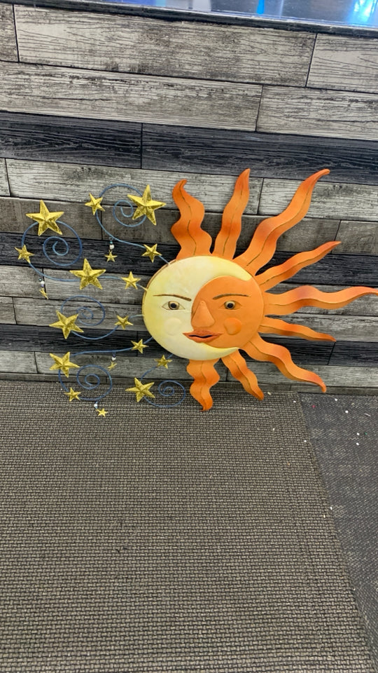 METAL SUN/MOON WALL HANGING.