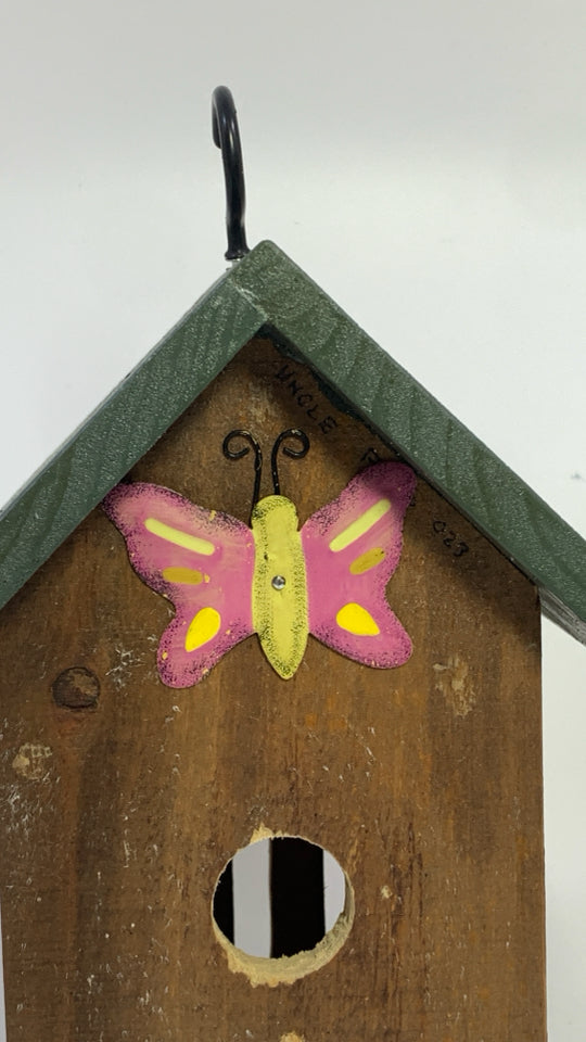 WOOD BIRDHOUSE W/BUTTERFLY DETAILS.