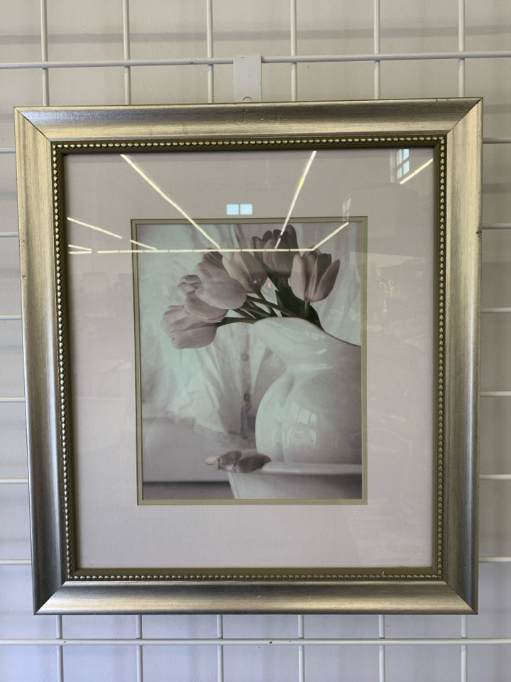 PINK TULIPS IN WHITE VASE IN SILVER FRAME.