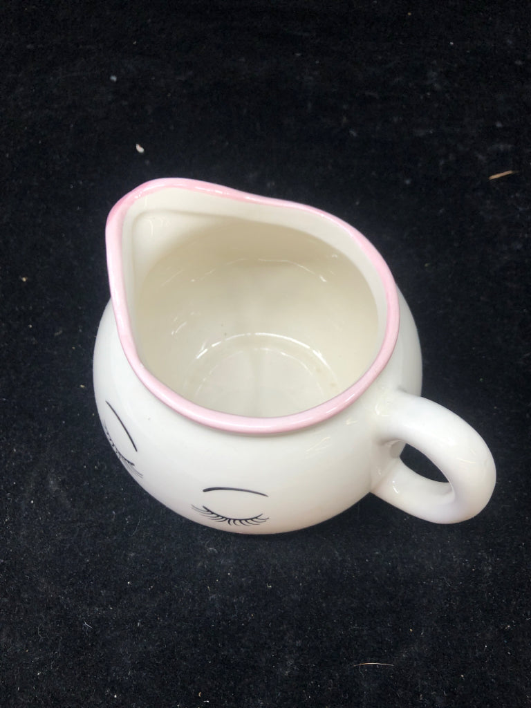 WOMANS FACE SMALL PITCHER.