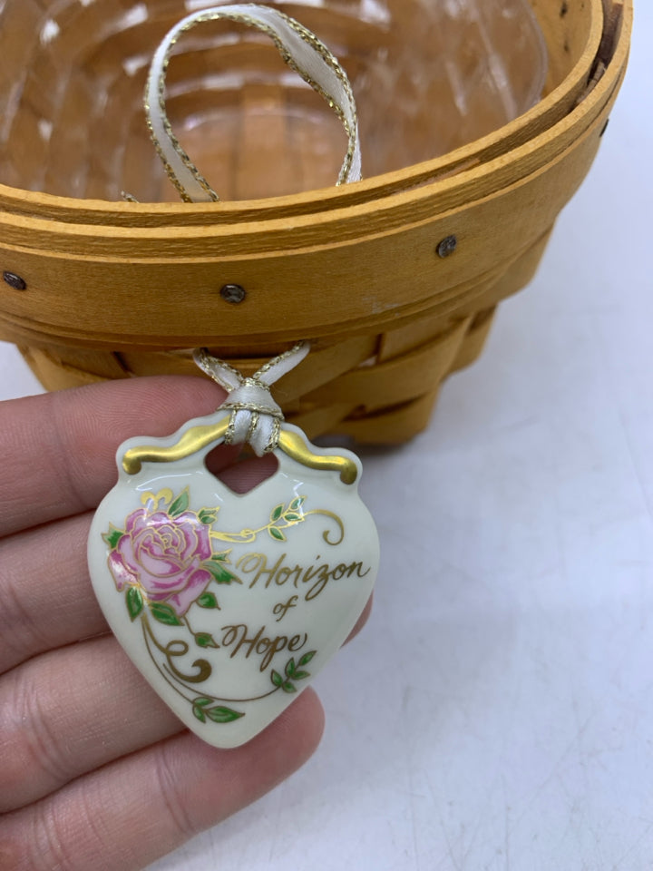 1999 OVAL HORIZON OF HOPE BASKET W/ PROTECTOR & TIER-ON.