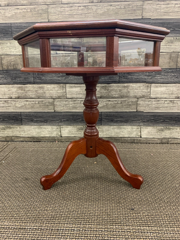 BUTLER HEXAGON SHAPED DARK WOOD DISPLAY TABLE.