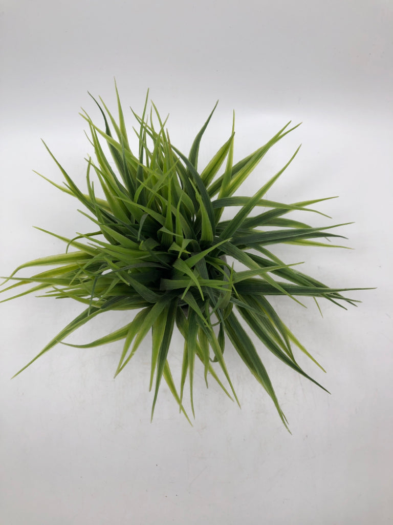 SM FAUX GRASS IN STONEWARE PLANTER.