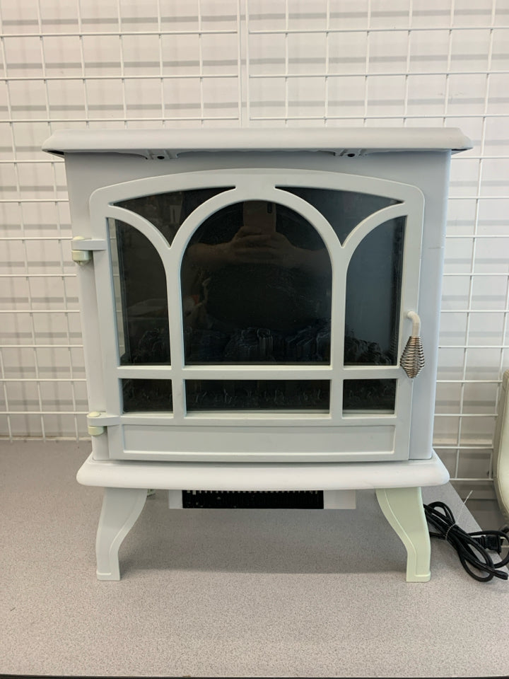 LIGHT BLUE ELECTRIC STOVE FIREPLACE.