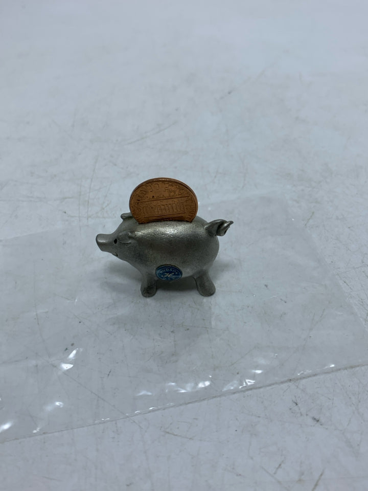 MINI PIGGY BANK W/ PENNY FIGURINE.