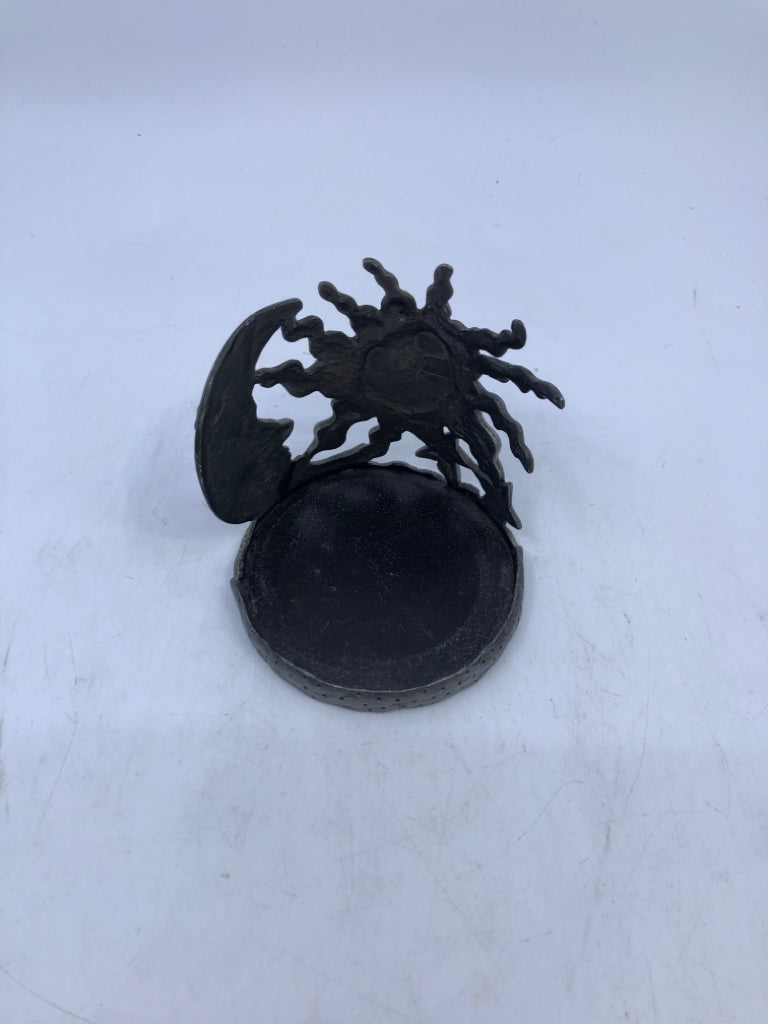 SUN/STAR METAL TEA LIGHT HOLDER.