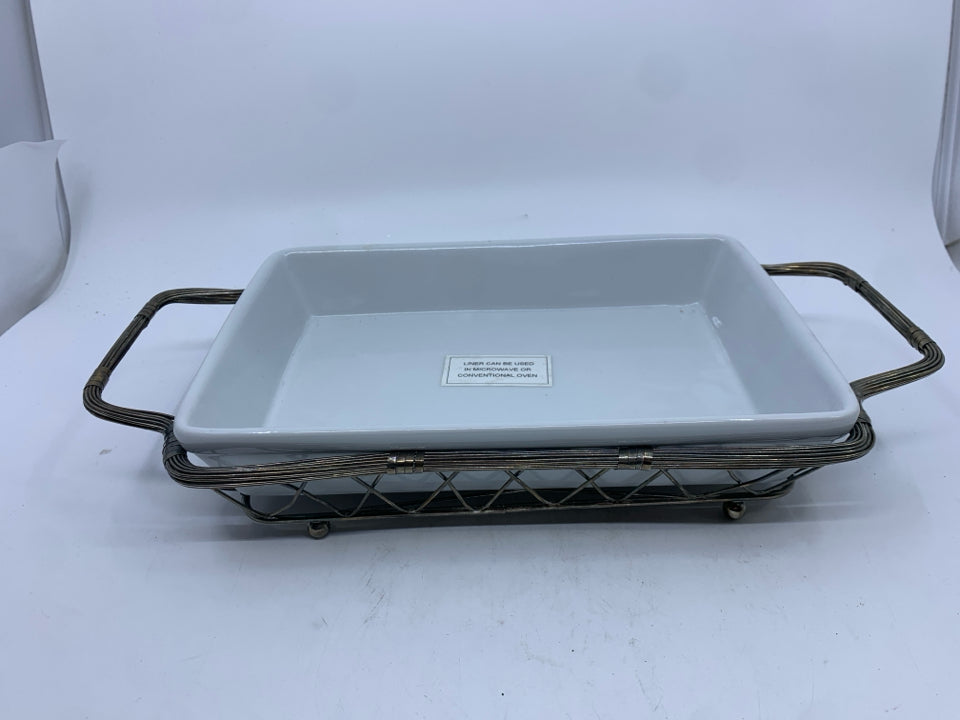 WHITE RECTANGLE SERVER IN SILVER METAL TRAY.