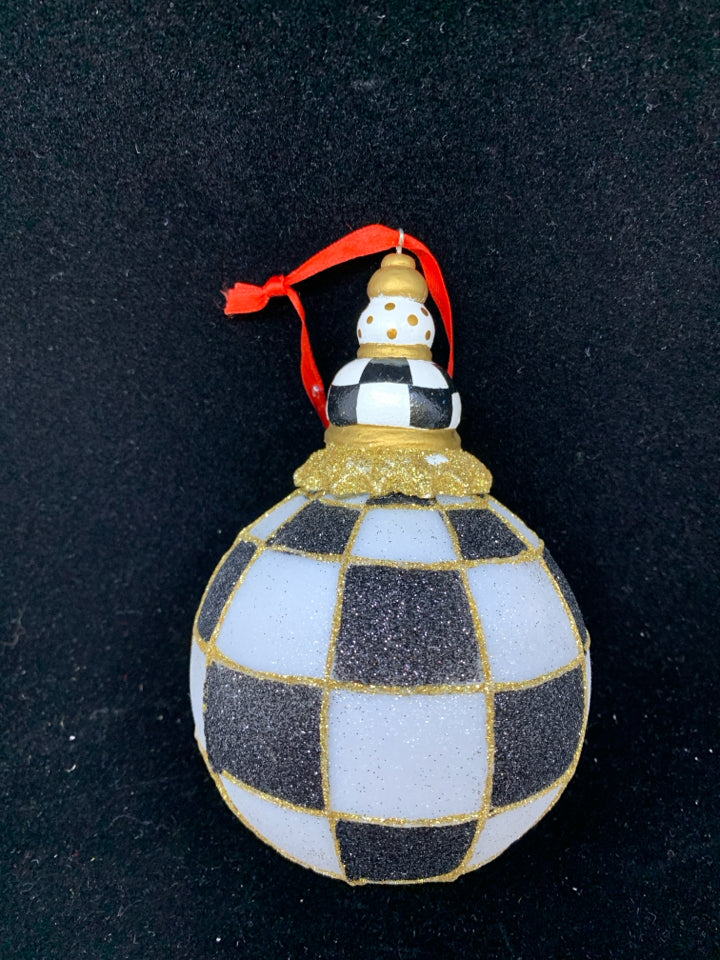 SPARKLY CHECKERED BALL ORNAMENT W/ DOT BULB ON TOP.