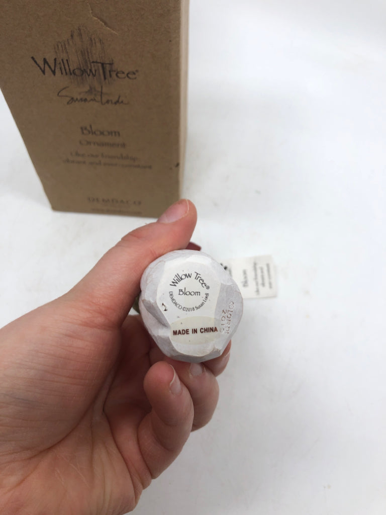 NIB GIRL HOLDING FLOWERS "BLOOM" ORNAMENT.
