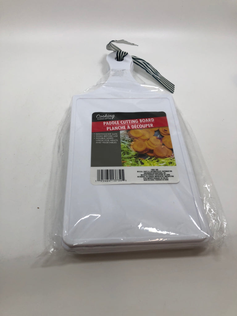 NIP WHITE PLASTIC CUTTING BOARDS.