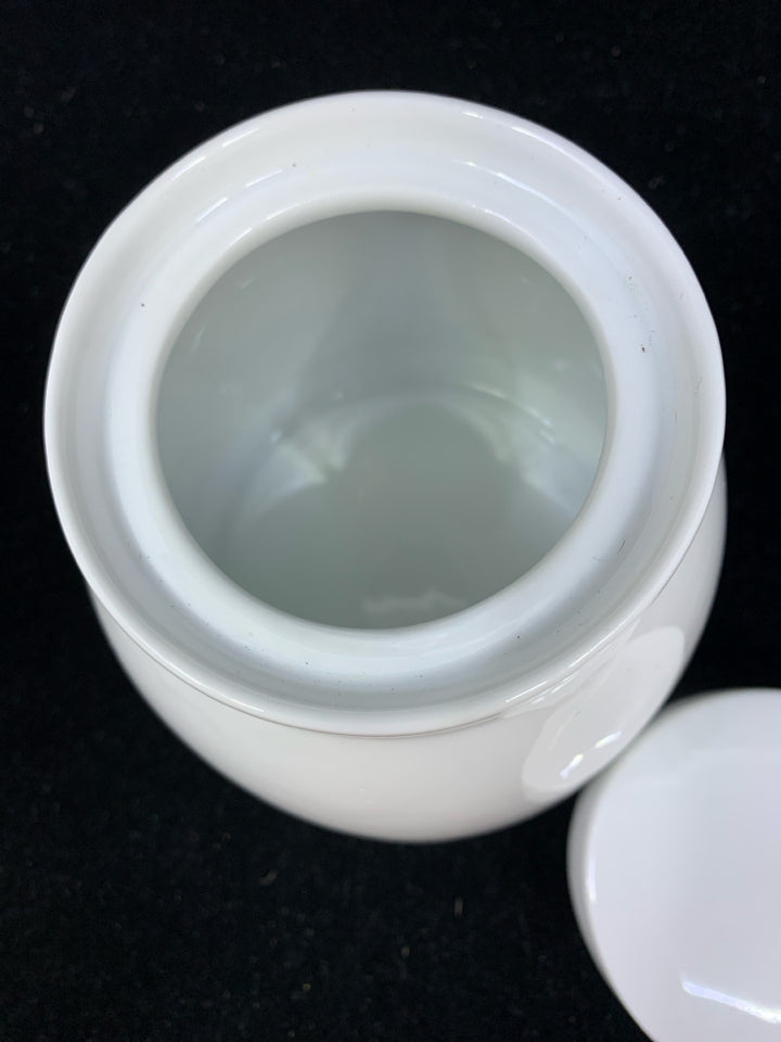 WHITE CANISTER.