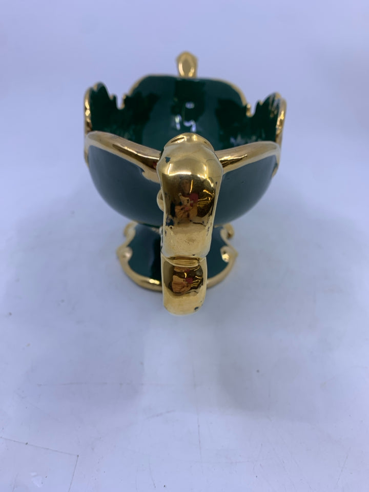 GREEN GOLD CERAMIC FOOTED OVAL PLANTER W/ FLOWER DESIGN SIGNED.