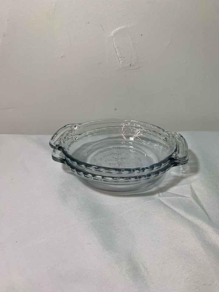 2 SMALL ANCHOR HOCKING PIE DISHES.