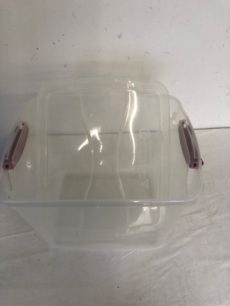 CLEAR RUBBERMAID STORAGE BIN W/LOCKING RED HANDLES.