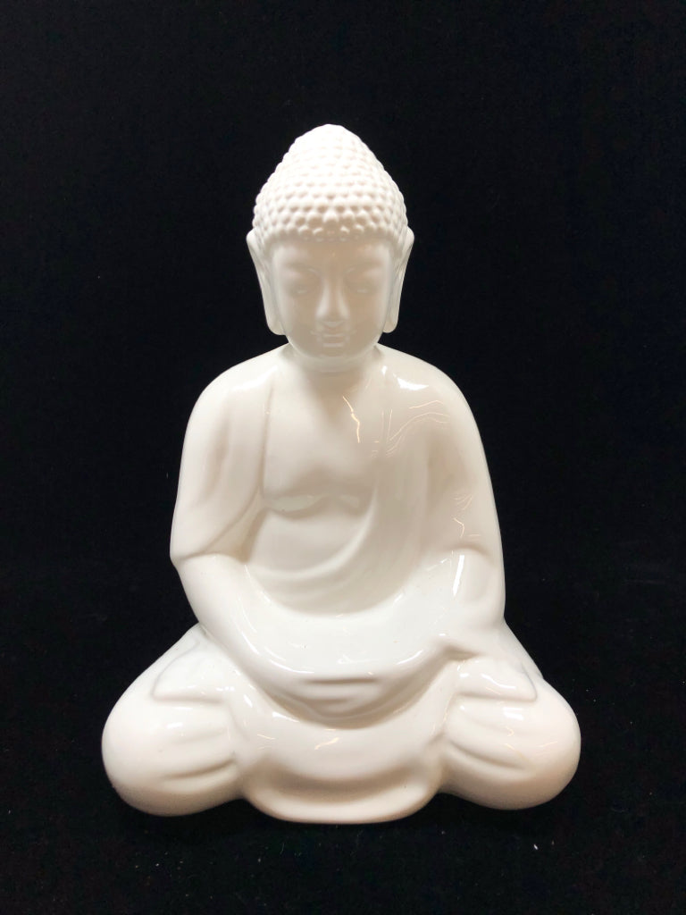 WHITE CERAMIC BUDDHA SCULPTURE.