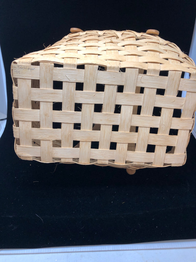 SLANTED BASKET W 2 WOODEN HANDLES.