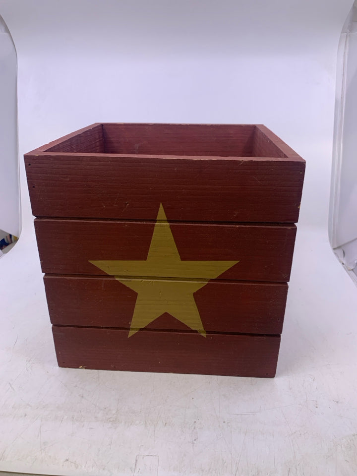 MAROON PAINTED BOX W/ YELLOW STAR.