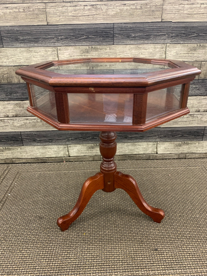 BUTLER HEXAGON SHAPED DARK WOOD DISPLAY TABLE.