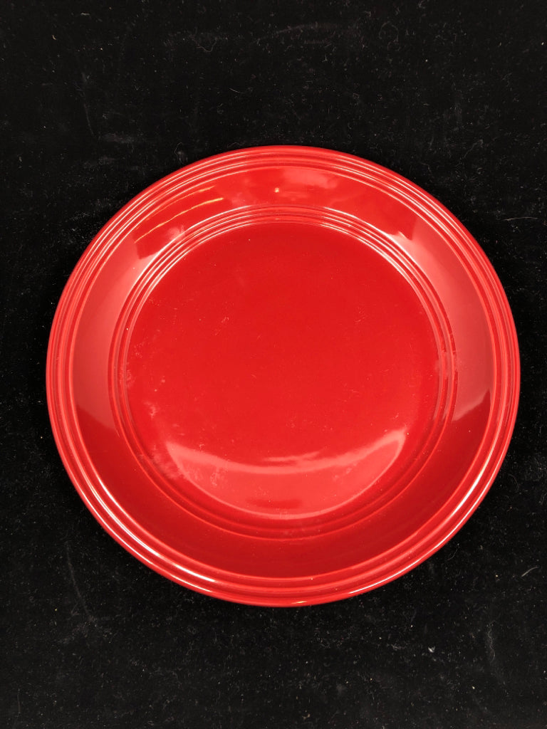 4 HEAVY RED DINNER PLATES.