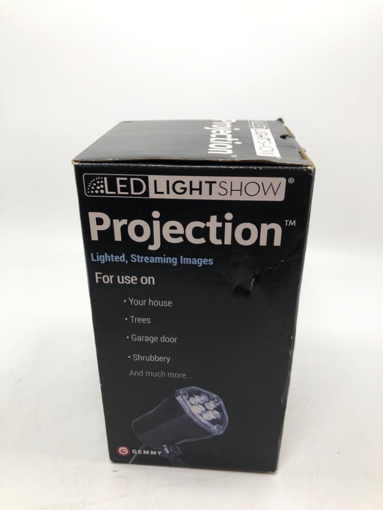 NIB WITCH PROJECTION LIGHT SHOW.