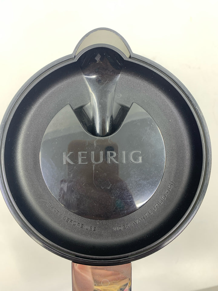 BLACK PLASTIC KEURIG CARAFFE.