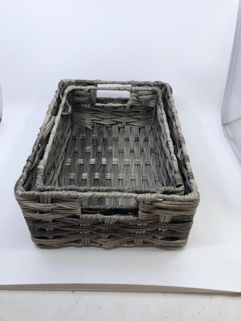 2 GREY WOVEN NESTING BASKETS W HANDLES.
