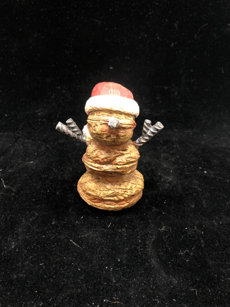 CHESTNUT SNOWMAN W/SANTA HAT RESIN FIGURINE.