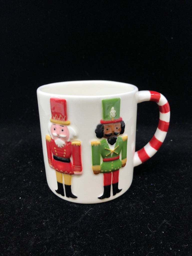 EMBOSSED NUT CRACKER MUG.