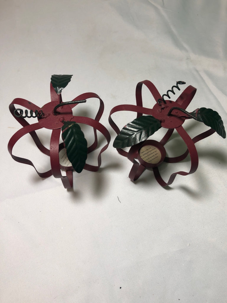2 RED METAL APPLE SHAPED TEA LIGHT HOLDERS.