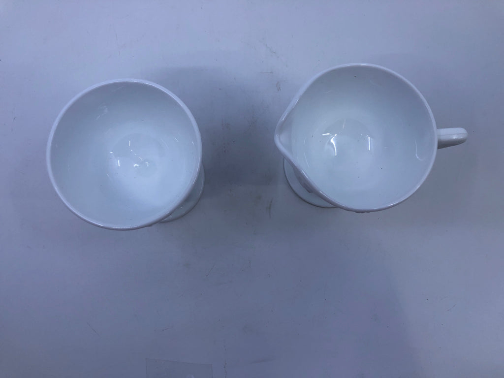 VTG 2PC FOOTED MILK GLASS EMBOSSED SUGAR AND CREAMER.