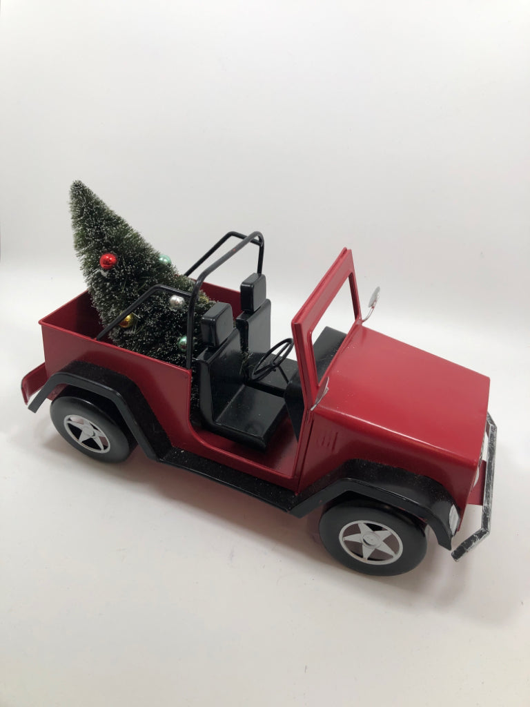 RED METAL JEEP W/CHRISTMAS TREE.