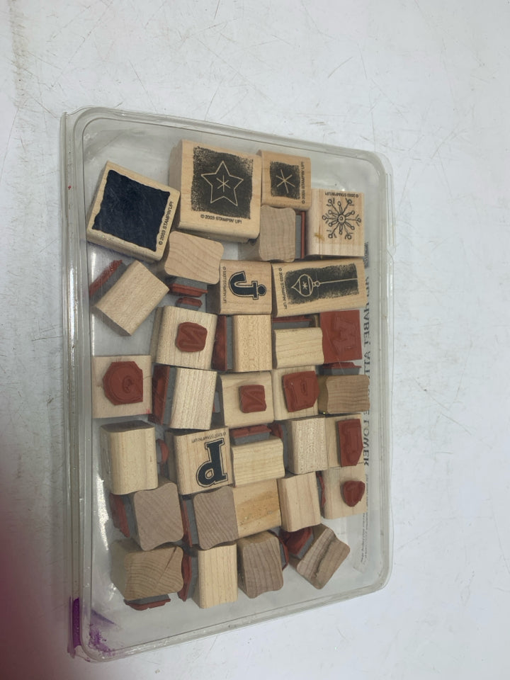 STAMPS IN CASE.
