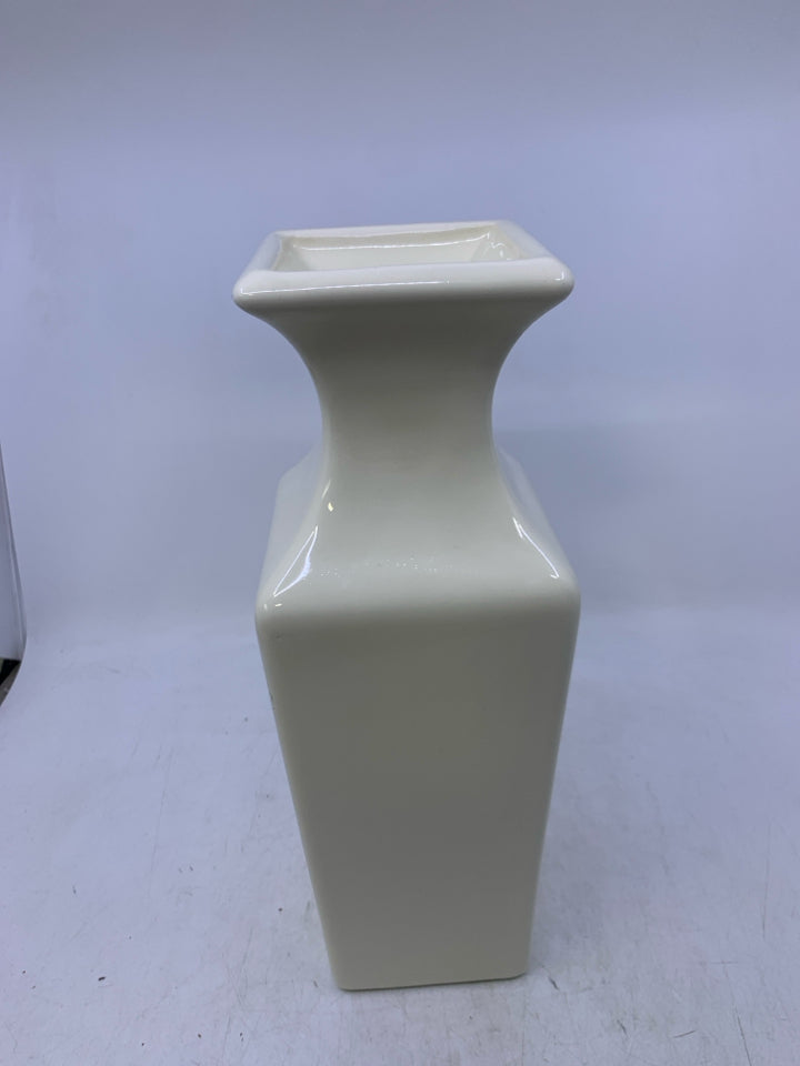 HEAVY CREAM CERAMIC VASE.