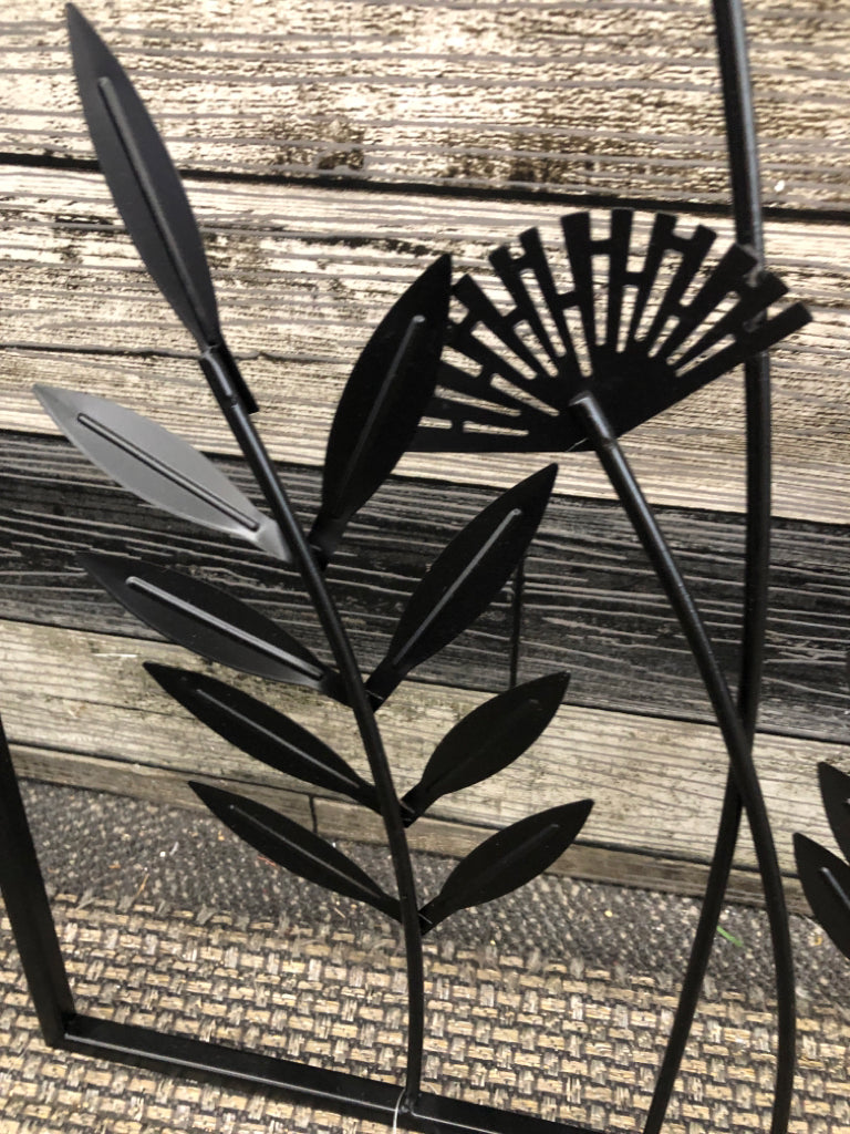 BLACK METAL DANDELION AND LEAVES WALL HANGING.