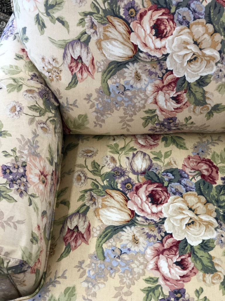 FLORAL SWIVEL ROCKER.