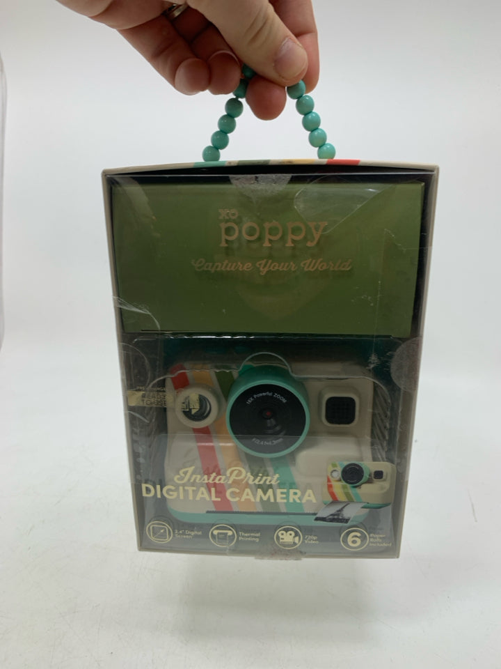 NIB POPPY INSTANT PRINT DIGITAL CAMERA.