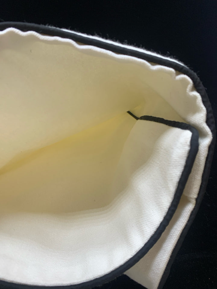 CREAM W/BLACK TRIM PILLOW COVER.