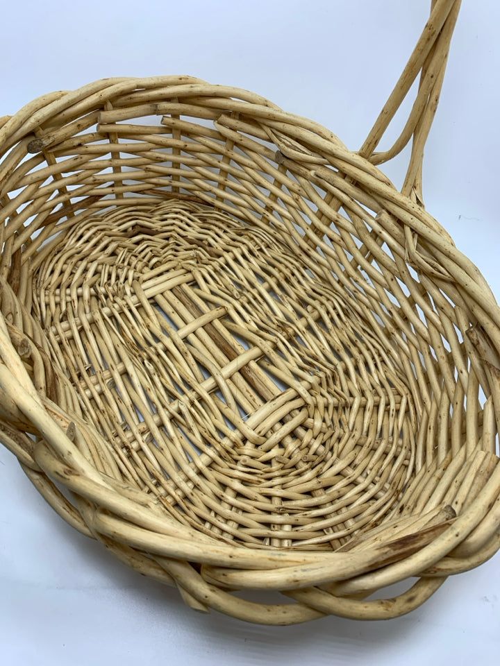 OVAL WICKER BASKET W/LARGE HANDLE.