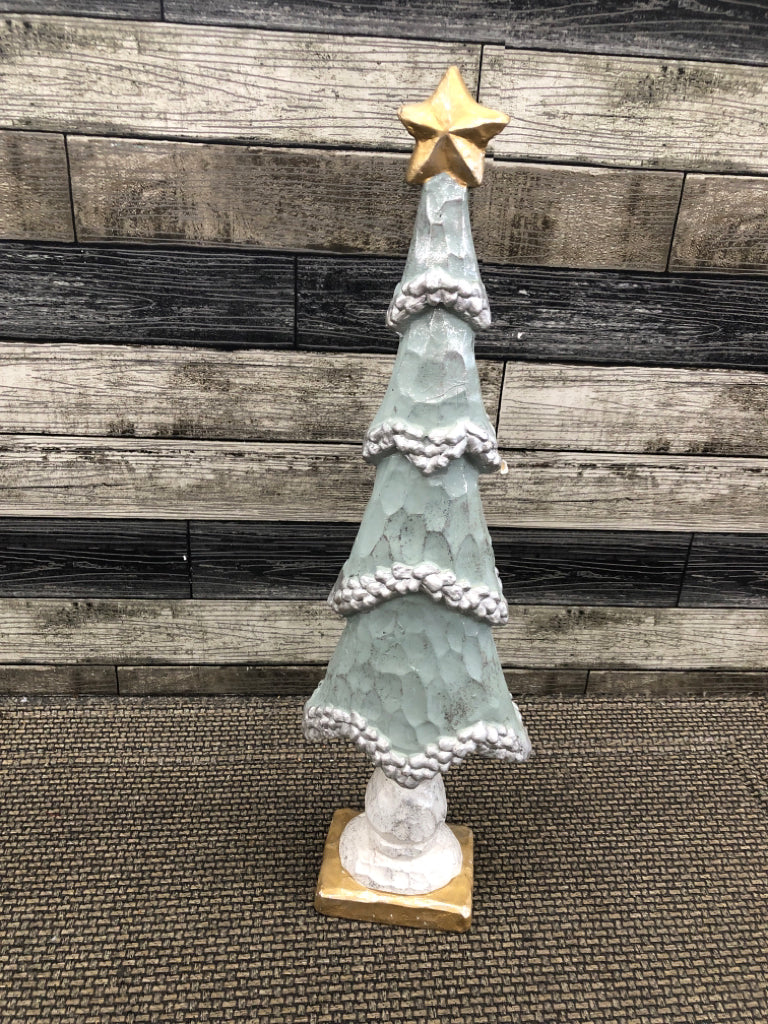 TALL BLUE CERAMIC CARVED CHRISTMAS TREE.