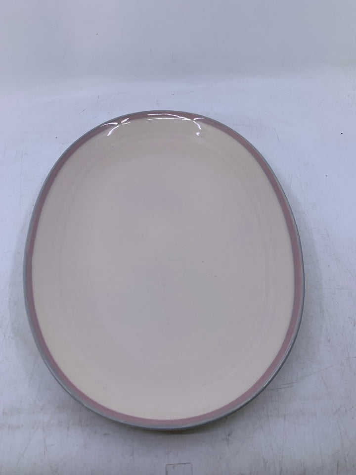 CREAM OVAL PLATTER W/ PINK EDGE.