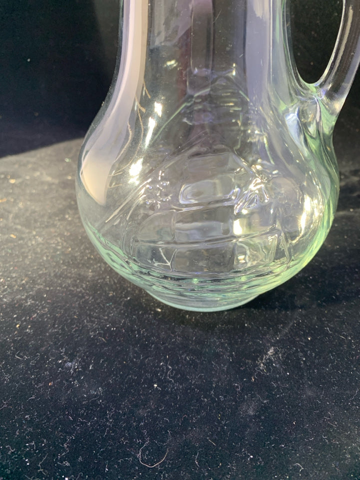 SMALL GLASS PITCHER W/ EMBOSSED SAILBOAT.