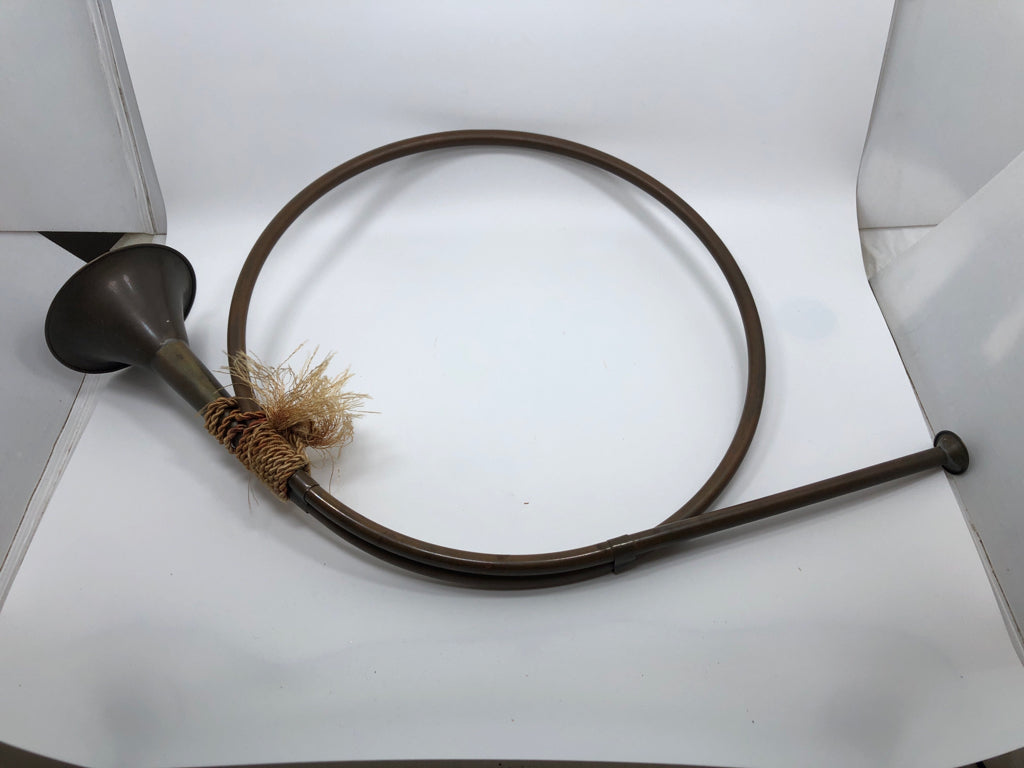 VTG BRASS HORN DECOR W/TWINE.