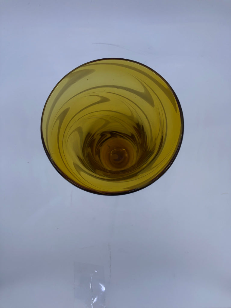 AMBER GLASS FOOTED VASE W/WHITE SWIRL.