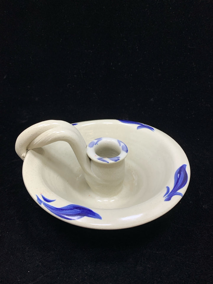 BLUE FLORAL POTTERY CANDLESTICK HOLDER.