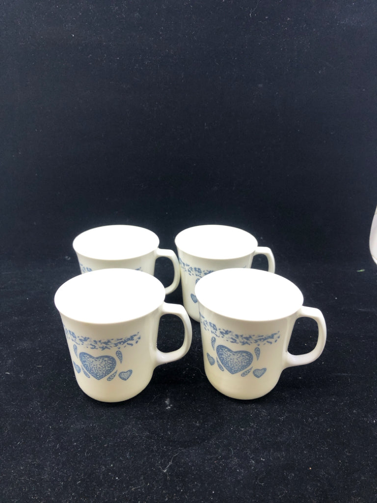 4 CORNING WARE HEART PATTERN MUGS.