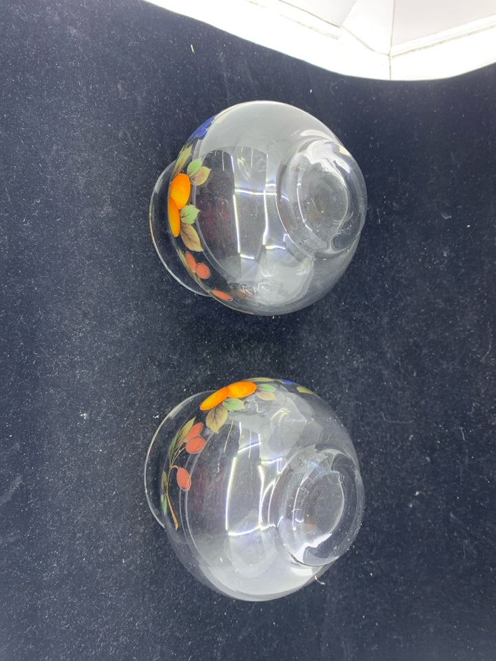 2 FRUIT GLASS CANDLE HOLDERS.