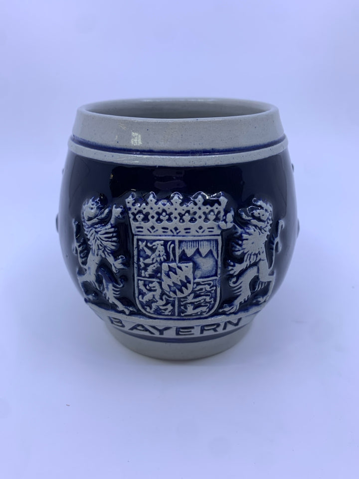 COREZELIUS COBALT BLUE MUG W/ GRAY DESIGNS.