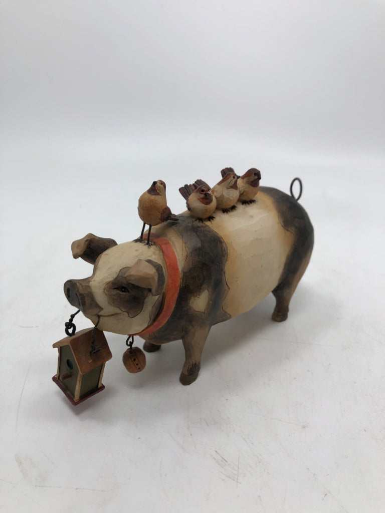 BIRDS ON PIG CARVED FIGURE.