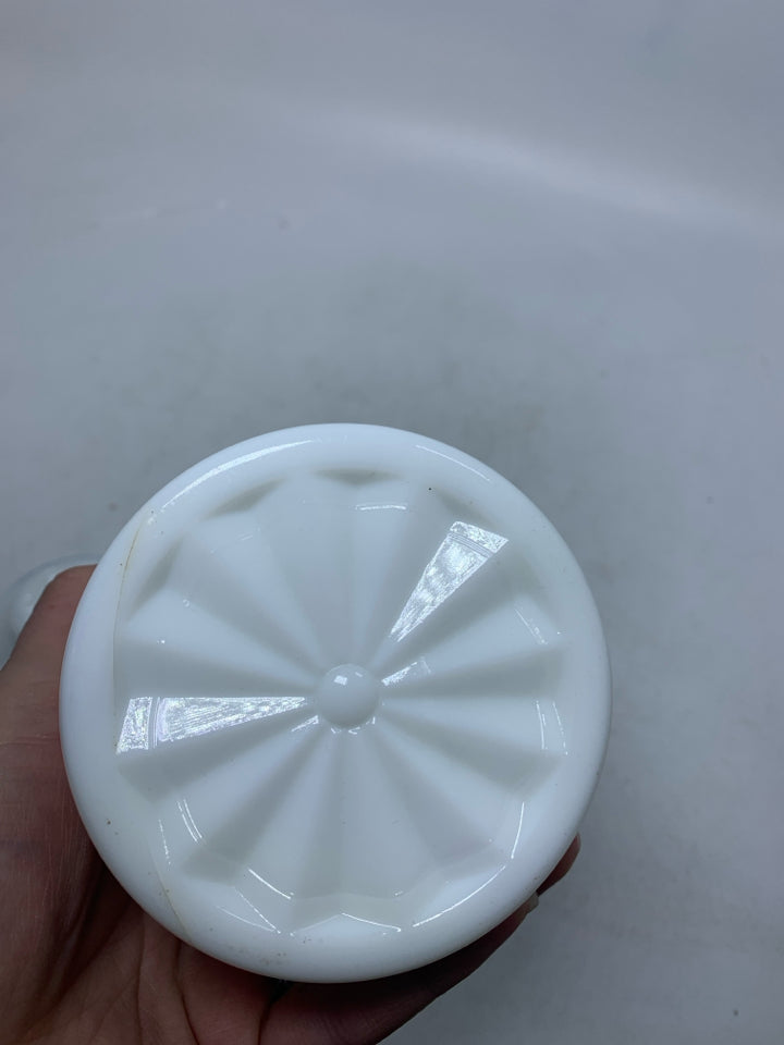 VTG SMALL MILK GLASS CANISTER W/ EAGLE COIN DETAILS.